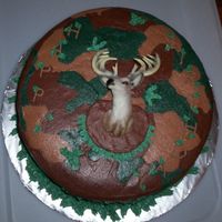 Camo And Deer Head I got this idea from someone on the site..sorry can't remember who...hers looks much better though!!. White cake with buttercream...