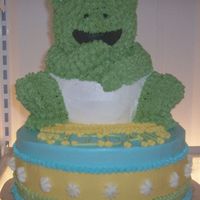 Frog In Diaper 10" round (2 layers) in chocolate, Wilton bear turned into frog white cake with Whipped Cream Buttercream Icing...I personally did not...