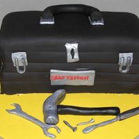 Toolbox 4 Dad my dad owns more tools than anyone I know so I made this toolbox cake for him for his b-day. It's my first 3-d cake and also the first...