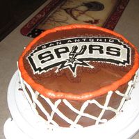 Go Spurs! Spurs basketball hoop cake for my uncle's birthday. He really liked it. It was a german chocolate cake with chocolate buttercream and...