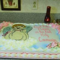 Scan0026.jpg Communion cake for my brother's friend. They wanted an angel on it.