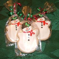 Snowmen Cookies NFSC with royal icing and sugar holly accent.