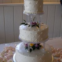 Second Commissioned Wedding Cake This is the 2nd wedding cake I have done after my daughter's wedding cake. The tiers are 14 inch white, 10 inch chocolate and 6 inch...