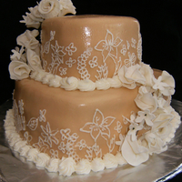 White And Ivory Anniversary Two heart shaped layers, design adapted from a Wilton book. Covered in fondant; gumpaste flowers.