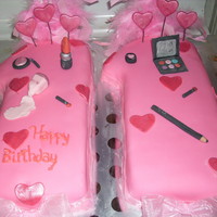 A Lot Of Pink I don't know if I like this one or not. Cakes are shaped like the number 11. I covered them in mmf and the "makeup" is made...