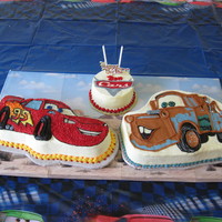 Disney Cars Cakes For Benjamin Lightening McQueen is chocolate fudge with buttercream using a Wilton Pan. Mater and the logo are buttercream transfers and hand carved....