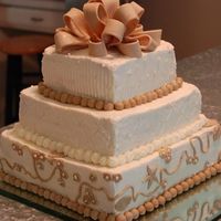 Wedding Shower Cake Buttercream with fondant accents.