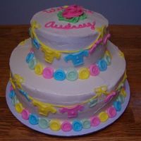 Baby Shower Cake This cake was done with regular buttercream icing and the decorations are fondont.