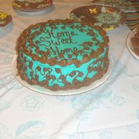 Housewarming Party made this cake to match the colors of the plates, made with buttercream