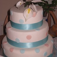 Spotty Wedding Cake spotty fondant iced with sugar arum lilies