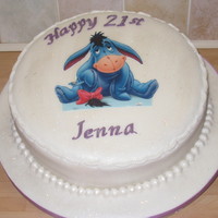 Birthday Cake vanilla cake and filling. edible eeyore on top!