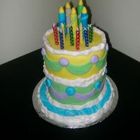 Tiny Tiered Birthday Cake Yellow cake with buttercream and fondant decorations