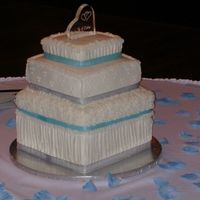 Blue/silver Wedding Cake White cake with raspberry filling