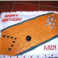Bowling Gel chocolate cake, buttercream iced, i used gel for the alley and candles for the ball and pins