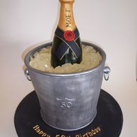 Champagne On Ice Cake I made one of these about 6 months ago, but I think this one came ot much better! It is all edible, the bottle is carved from cake and the...