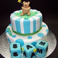 Welcome Baby! Chocolate mud bottom and vanilla top layer with fondant decorations.