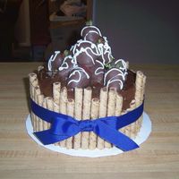 Chocolate Covered Strawberries chocolate covered strawberries w/hazelnut pirouette sticks.