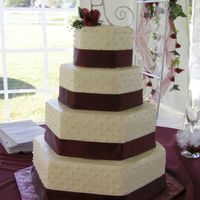 Hexagon Wedding Cake cake on cake hexagon pans 2 layer fondant pearls and silk ribbon.