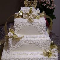 Anniversary Cake Cake on Cake square pans, gumpaste flowers Taught a friend different techniques and she was able to learn and practice on this cake. Easy...