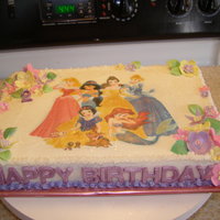 Disney Princess Sheet Cake edible image inhanced with luster dust and powdered color... Gumpaste flowers and chocolate work with small edible pearls