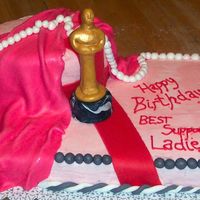 Oscar Cake this was for multiple ladies, all turning 50Buttercream, with fondant sculptures