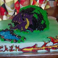Dragon Cake For My Nephew Buttercream, colorflow, a bit of carving for the cave...