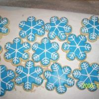Snowflake Cookies These are for the kids teachers at school. Just NFSC and Royal Icing. Didnt have any meringue powder so used grama's old recipe using...
