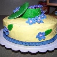 Birthday Cake Cake is covered in buttercream, with gumpaste flowers and accents. Thanks for looking!