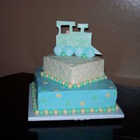 Baby Train Bad Migraine + Cake Decorating = Uneven edges and diamond patterns not lining up! I had to make this cake and had a migraine for 3 days...