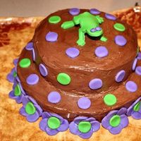 Froggy Cake Cake I helped a friend make last year for her daughter. Purple and frogs held special significance for them. Chocolate cake, chocolate BC...