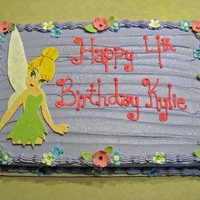 Tinker Bell Full Sheet Cake Yellow/chocolate marble cake with fondant figure and flowers. I still get a lot of orders for sheet cakes!