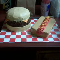 Hamburger And Hotdog I made this cake for a Labor Day party. It was my first time making a hamburger and hotdog but I think they turned out pretty good.