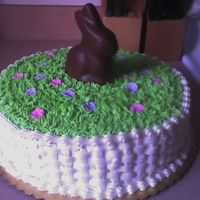 Easter Basket Buttercream grass and basketweave with royal icing flowers.