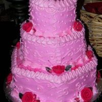 Pink Hexagon Weddingcake Three tier Hexagon shape with strawberry flavored cake and fresh fruit strawberry filling