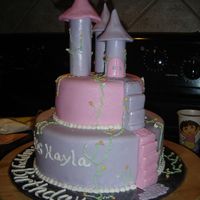Princess Birthday Party Used a few ideas from cakes on cc. The little towers at the top are paper towel rolls cut to size and covered in mmf. I love the little...