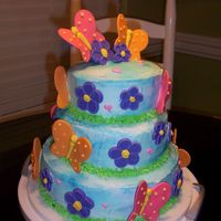 Butterfly Cake This was my first try at a tiered cake and at color mist (messy). Second attempt at fondant (fun!)