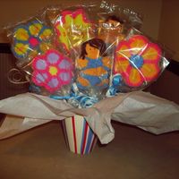 My First Cookie Boquet My first attempt at a cookie boquet. It was for my friend's birthday. I love the gingerbread people. These two are in swim suits. I...