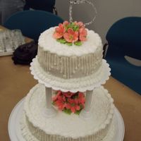 Course Iii Final Tiered Wedding Style Cake Buttercream with peach petunias. I tried duplicating a cake out of the 2006 Wilton Yearbook. I guess I'm one who follows directions...