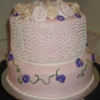 Lee's Bridal Shower Cake it was a surprise shower for her at work and it's my first paid cake :)..chocolate cake with caramel-vanilla filling is the top one...