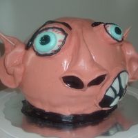 Ghoul One of my younger brothers asked for a cake and was delighted with this one...it is yellow cake with chocolate buttercream icing, covered...