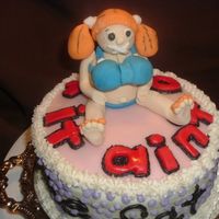 Mom's 60Th Birthday Cake the cake says "it ain't over 'til the fat lady sings" ...gumpaste figurine, she has tape over her mouth :).......