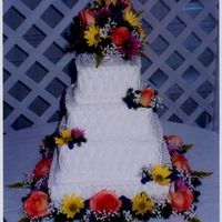 Summer Garden All b/c icing with real flowers. Thanks for looking.