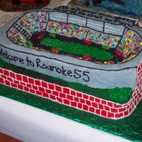 Packed House At The Racetrack My 18 year old daughter made this for 1st place at our fall festival. She stacked 2 sheet cakes and carved the top one. Decorated in Butter...