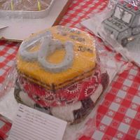 Rodeo Time This cake won first place in our festival for a western theme. It is decorated in rolled fondant. Sorry for the poor quality with the wrap...