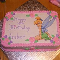 Tinkerbell Whipped icing edible image royal icing flowers.