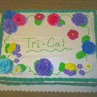 Flowers I made this cake for my Dad to take to his work for a potluck. This was basically a practice cake.