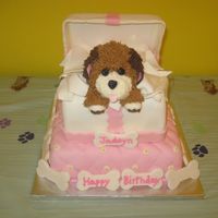 Surprise It's A Puppy A puppy coming out of the box surrounded by tissue paper made from mmf.