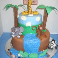 Zoo Cake This was a cake for a party at the Zoo. All the animals are made out of fondant.