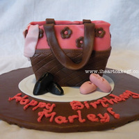 Dance Bag Mini Cake for my 7 year olds birthday. chocolate coconut cake with coconut cream filling. inspired by cupcake envy and roughly based on her dance bag...