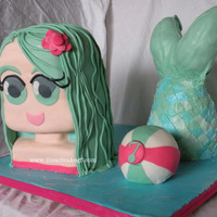 Mermaid Cake For my 7 year old birthday party, made to match the invites. coconut cake w/ coconut cream, yellow cake w/ chocolate buttercream- covered...